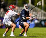 11 August 2022; Brennan O'Neill of USA against Luca Schurink of England during the 2022 World Lacrosse Men's U21 World Championship - Group A match between USA and England at the University of Limerick in Limerick. Photo by Tom Beary/Sportsfile