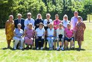 11 August 2022; Back row, from left, Imelda Noone, Tommy Delaney, Kathleen Ramsbottom, Ann Delaney, Kathleen Caulfield, Margaret O'Connell, Ursula Grace, Joseph Noone and Patrica Noone, with, front row, Connie Jordan, Teresa Walsh, Catherine Rafferty, Linda Gorman, Carol Neary and Teresa Doyle during a reunion event, at the CityNorth Hotel in Meath, to mark the 50th anniversary of the Jeyes team from 1972 who went on a four-game tour of France. Jeyes were a Dublin-based factory women's team who accepted an invitation to travel to France for a mini tour that included taking on Stade de Reims. Photo by Stephen McCarthy/Sportsfile