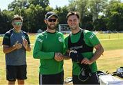 12 August 2022; Ireland captain Andrew Balbirnie, left, presents Fionn Hand of Ireland with his cap before the Men's T20 International match between Ireland and Afghanistan at Stormont in Belfast. Photo by Ramsey Cardy/Sportsfile