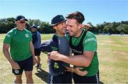 12 August 2022; Ireland head coach Heinrich Malan with Ireland debutant Fionn Hand before the Men's T20 International match between Ireland and Afghanistan at Stormont in Belfast. Photo by Ramsey Cardy/Sportsfile