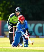 12 August 2022; Rahmanullah Gurbaz of Afghanistan and Ireland wicketkeeper Lorcan Tucker during the Men's T20 International match between Ireland and Afghanistan at Stormont in Belfast. Photo by Ramsey Cardy/Sportsfile