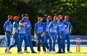 12 August 2022; Afghanistan celebrate after dismissing Curtis Campher of Ireland during the Men's T20 International match between Ireland and Afghanistan at Stormont in Belfast. Photo by Ramsey Cardy/Sportsfile
