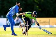 12 August 2022; George Dockrell of Ireland narrowly avoids being run-out during the Men's T20 International match between Ireland and Afghanistan at Stormont in Belfast. Photo by Ramsey Cardy/Sportsfile