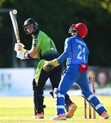 12 August 2022; Fionn Hand of Ireland and Afghanistan wicketkeeper Rahmanullah Gurbaz during the Men's T20 International match between Ireland and Afghanistan at Stormont in Belfast. Photo by Ramsey Cardy/Sportsfile