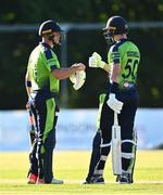 12 August 2022; Fionn Hand, left, and George Dockrell of Ireland during the Men's T20 International match between Ireland and Afghanistan at Stormont in Belfast. Photo by Ramsey Cardy/Sportsfile