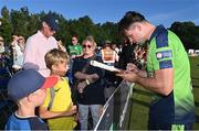 12 August 2022; Fionn Hand of Ireland signs autographs after the Men's T20 International match between Ireland and Afghanistan at Stormont in Belfast. Photo by Ramsey Cardy/Sportsfile