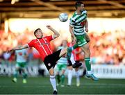 12 August 2022; Ciarán Coll of Derry City in action against Neil Farrugia of Shamrock Rovers during the SSE Airtricity League Premier Division match between Derry City and Shamrock Rovers at The Ryan McBride Brandywell Stadium in Derry. Photo by Stephen McCarthy/Sportsfile