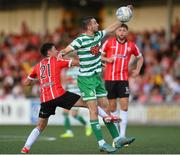 12 August 2022; Neil Farrugia of Shamrock Rovers in action against Declan Glass of Derry City during the SSE Airtricity League Premier Division match between Derry City and Shamrock Rovers at The Ryan McBride Brandywell Stadium in Derry. Photo by Stephen McCarthy/Sportsfile