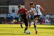 12 August 2022; Steven Bradley of Dundalk in action against Laurenz Dehl of Bohemians during the SSE Airtricity League Premier Division match between Bohemians and Dundalk at Dalymount Park in Dublin. Photo by Sam Barnes/Sportsfile