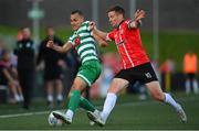 12 August 2022; Graham Burke of Shamrock Rovers in action against Patrick McEleney of Derry City during the SSE Airtricity League Premier Division match between Derry City and Shamrock Rovers at The Ryan McBride Brandywell Stadium in Derry. Photo by Stephen McCarthy/Sportsfile
