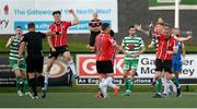 12 August 2022; Derry City players, including Cameron McJannet, left, and Mark Connolly, right, celebrate after referee Paul McLaughlin awarded a penalty in their favour during the SSE Airtricity League Premier Division match between Derry City and Shamrock Rovers at The Ryan McBride Brandywell Stadium in Derry. Photo by Stephen McCarthy/Sportsfile