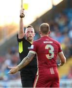 12 August 2022; Stephen Walsh of Galway United is shown a yellow card by referee Alan Patchell during the SSE Airtricity League First Division match between Waterford and Galway United at RSC in Waterford. Photo by Michael P Ryan/Sportsfile