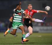 12 August 2022; Mark Connolly of Derry City in action against Aidomo Emakhu of Shamrock Rovers during the SSE Airtricity League Premier Division match between Derry City and Shamrock Rovers at The Ryan McBride Brandywell Stadium in Derry. Photo by Stephen McCarthy/Sportsfile