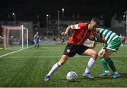 12 August 2022; Michael Duffy of Derry City in action against Sean Hoare of Shamrock Rovers during the SSE Airtricity League Premier Division match between Derry City and Shamrock Rovers at The Ryan McBride Brandywell Stadium in Derry. Photo by Stephen McCarthy/Sportsfile