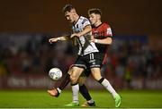 12 August 2022; John Martin of Dundalk in action against Rory Feely of Bohemians during the SSE Airtricity League Premier Division match between Bohemians and Dundalk at Dalymount Park in Dublin. Photo by Sam Barnes/Sportsfile