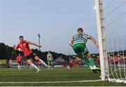 12 August 2022; Patrick McEleney of Derry City has a shot on goal blocked by Lee Grace of Shamrock Rovers during the SSE Airtricity League Premier Division match between Derry City and Shamrock Rovers at The Ryan McBride Brandywell Stadium in Derry. Photo by Stephen McCarthy/Sportsfile