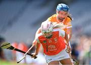7 August 2022; Rachael Merry of Armagh in action against Maria McLarnon of Antrim during the Glen Dimplex All-Ireland Premier Junior Camogie Championship Final match between Antrim and Armagh at Croke Park in Dublin. Photo by Seb Daly/Sportsfile