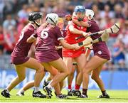 7 August 2022; Joanne Casey of Cork is tackled by Ally Hesnan of Galway, right, during the Glen Dimplex All-Ireland Intermediate Camogie Championship Final match between Cork and Galway at Croke Park in Dublin. Photo by Seb Daly/Sportsfile