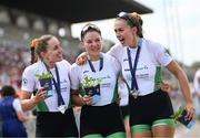 13 August 2022; Members of the Ireland Women's Four team, from left, Natalie Long, Tara Hanlon and Eimear Lambe after winning a silver medal in the Women's Four Final during day 3 of the European Championships 2022 at the Olympic Regatta Centre in Munich, Germany. Photo by David Fitzgerald/Sportsfile