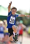 13 August 2022; Aaron Mulhall from Shillelagh, Wicklow, competes in the boys long jump U12 & O10 during the Aldi Community Games National Track and Field Finals that attract over 2,000 children to SETU Carlow Sports Campus in Carlow. Photo by Sam Barnes/Sportsfile