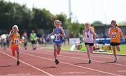 13 August 2022; Sadhbh Quinn, from Dalkey, Dublin, on her way to winning the girls 80m U8 & O6 during the Aldi Community Games National Track and Field Finals that attract over 2,000 children to SETU Carlow Sports Campus in Carlow. Photo by Ramsey Cardy/Sportsfile