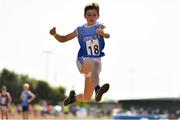 13 August 2022; Cian Fitzpatrick from Cavan competes in the boys long jump U12 & O10 during the Aldi Community Games National Track and Field Finals that attract over 2,000 children to SETU Carlow Sports Campus in Carlow. Photo by Sam Barnes/Sportsfile