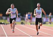 13 August 2022; Brian Malone of Craughwell AC, left, and Cormac Kearney of Craughwell AC, competing in the men's vet45 100 metres during the Irish Life Health National Masters Track and Field Championships in Tullamore, Offaly. Photo by Seb Daly/Sportsfile