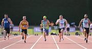 13 August 2022; Athletes, from left, Martin O'Donnell of Olympian Youth AC, Garrett Flynn of Leevale AC, António Mouro of Portugal, Brian Malone of Craughwell AC, and Cormac Kearney of Craughwell AC, competing in the men's vet45 100 metres during the Irish Life Health National Masters Track and Field Championships in Tullamore, Offaly. Photo by Seb Daly/Sportsfile