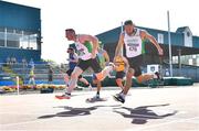 13 August 2022; Brian Malone of Craughwell AC, left, and Cormac Kearney of Craughwell AC dip for the line whilst competing in the men's vet45 100 metres during the Irish Life Health National Masters Track and Field Championships in Tullamore, Offaly. Photo by Seb Daly/Sportsfile