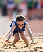 13 August 2022; Conor Brennan from Drumlish-Ballinamuck, Longford, competes in the boys long jump U12 & O10 during the Aldi Community Games National Track and Field Finals that attract over 2,000 children to SETU Carlow Sports Campus in Carlow. Photo by Sam Barnes/Sportsfile