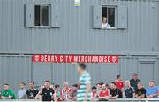 12 August 2022; Derry City secretary Dodie McGuinness watches on from her office during the SSE Airtricity League Premier Division match between Derry City and Shamrock Rovers at The Ryan McBride Brandywell Stadium in Derry. Photo by Stephen McCarthy/Sportsfile