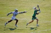 13 August 2022; Fionn Kinsella of Ireland in action against Dante Bowen of Jamaica during the 2022 World Lacrosse Men's U21 World Championship - Pool C match between Ireland and Jamaica at University of Limerick in Limerick. Photo by Tom Beary/Sportsfile