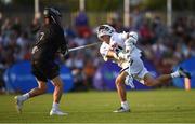 13 August 2022; Lance Tillman of USA in action against Dylan Snow of Haudenosaunee during the 2022 World Lacrosse Men's U21 World Championship - Pool A match between USA and Haudenosaunee at University of Limerick. Photo by Tom Beary/Sportsfile