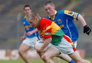 9 May 2004; Brian Carbery, Carlow, in action against Donal Ledwith, Longford. Bank of Ireland Leinster Senior Football Championship, Carlow v Longford, O'Connor Park, Tullamore, Co. Offaly. Picture credit; David Maher / SPORTSFILE