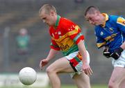 9 May 2004; Brian Carbery, Carlow, in action against Donal Ledwith, Longford. Bank of Ireland Leinster Senior Football Championship, Carlow v Longford, O'Connor Park, Tullamore, Co. Offaly. Picture credit; David Maher / SPORTSFILE