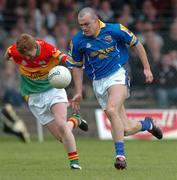 9 May 2004; Paul Barden, Longford, in action against Barry English, Carlow. Bank of Ireland Leinster Senior Football Championship, Carlow v Longford, O'Connor Park, Tullamore, Co. Offaly. Picture credit; David Maher / SPORTSFILE