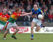 9 May 2004; Paul Barden, Longford, in action against Barry English, Carlow. Bank of Ireland Leinster Senior Football Championship, Carlow v Longford, O'Connor Park, Tullamore, Co. Offaly. Picture credit; David Maher / SPORTSFILE