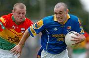 9 May 2004; Paul Barden, Longford, in action against Brian Carbery, Carlow. Bank of Ireland Leinster Senior Football Championship, Carlow v Longford, O'Connor Park, Tullamore, Co. Offaly. Picture credit; David Maher / SPORTSFILE