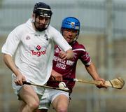 16 May 2004; Ciaran Divilly, Kildare, in action against Paul Greville, Westmeath. Guinness Leinster Senior Hurling Championship, Westmeath v Kildare, Cusack Park, Mullingar, Co. Westmeath. Picture credit; Pat Murphy / SPORTSFILE