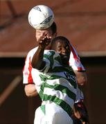 21 May 2004; Mark Rutherford, Shamrock Rovers, in action against Clive Delaney, Derry City. eircom league, Premier Division, Shamrock Rovers v Derry City, Richmond Park, Dublin. Picture credit; David Maher / SPORTSFILE