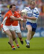 23 May 2004; Dick Clerkin, Monaghan, in action against Aidan O'Rourke, Armagh. Bank of Ireland Ulster Senior Football Championship, Monaghan v Armagh, St. Tighernach's Park, Clones, Co. Monaghan. Picture credit; Damien Eagers / SPORTSFILE
