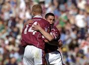23 May 2004; Westmeath's Joe Fallon celebrates with team-mate Denis Glennon, 14, after victory over Offaly. Bank of Ireland Leinster Senior Football Championship, Offaly v Westmeath, Croke Park, Dublin. Picture credit; Brian Lawless / SPORTSFILE