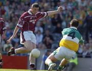 23 May 2004; Gary Dolan, Westmeath, has his shot blocked by Scott Brady, Offaly. Bank of Ireland Leinster Senior Football Championship, Offaly v Westmeath, Croke Park, Dublin. Picture credit;  Matt Browne / SPORTSFILE