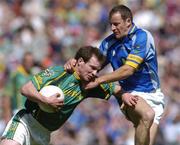 23 May 2004; Richie Kealy, Meath, is tackled by Donal McGillacuddy, Wicklow. Bank of Ireland Leinster Senior Football Championship, Meath v Wicklow, Croke Park, Dublin. Picture credit; Brian Lawless / SPORTSFILE