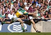 23 May 2004; Dessie Dolan, Westmeath, is tackled by Karol Slattery, Offaly. Bank of Ireland Leinster Senior Football Championship, Offaly v Westmeath, Croke Park, Dublin. Picture credit; Brian Lawless / SPORTSFILE