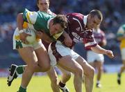 23 May 2004; Scott Brady, Offaly, is tackled by Michael Ennis, Westmeath. Bank of Ireland Leinster Senior Football Championship, Offaly v Westmeath, Croke Park, Dublin. Picture credit;  Matt Browne / SPORTSFILE
