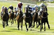 23 May 2004; Attraction, right, with Kevin Darley up, on their way to winning The Boylesports Irish 1,000 Guineas. Curragh Racecourse, Co. Kildare. Picture credit; SPORTSFILE