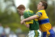 23 May 2004; Colm Cooper, Kerry, in action against Kevin Dilleen, Clare. Bank of Ireland Munster Senior Football Championship, Clare v Kerry, Cusack Park, Ennis, Co. Clare. Picture credit; Brendan Moran / SPORTSFILE