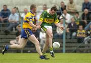 23 May 2004; William Kirby, Kerry, in action against David Russell, Clare. Bank of Ireland Munster Senior Football Championship, Clare v Kerry, Cusack Park, Ennis, Co. Clare. Picture credit; Brendan Moran / SPORTSFILE