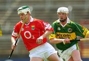 16 May 2004; Neil Ronan, Cork, in action against James McCarthy, Kerry. Guinness Munster Senior Hurling Championship, Cork v Kerry, Pairc Ui Chaoimh, Cork. Picture credit; Brendan Moran / SPORTSFILE